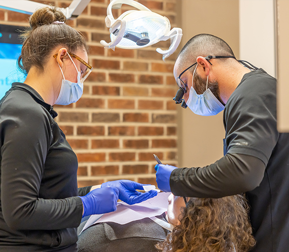 Woman receiving professional dental cleaning